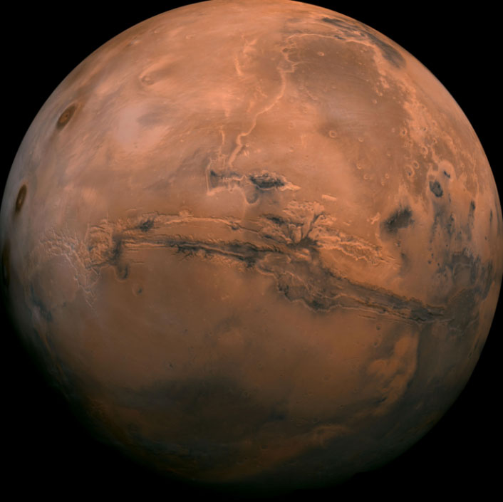 This biggest known canyon in our solar system stretches ---- miles across Mars in this montage image. The Martian canyon is more than 2,000 miles (3,000 kilometers) long, 370 miles (600 kilometers) wide and 5 miles (8 kilometers) deep. Image by NASA/JPL-Caltech on July 9, 2013.