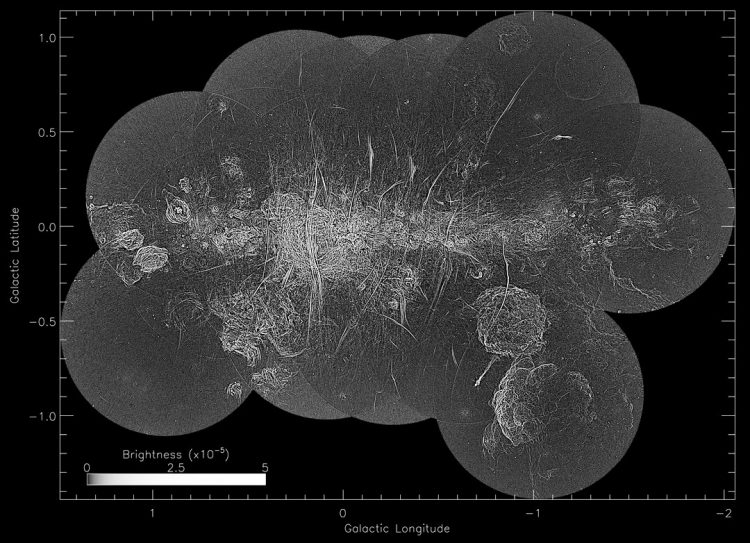 A mosaic image with the background removed to isolate the magnetic filaments that are the large, vertical slashes throughout the Milky Way Galaxy image. Source: Northwestern University.