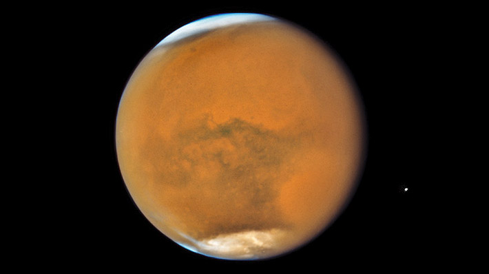 Mars has frigid polar ice caps. But the South Pole could have an underground liquid lake hiding under the ice. Mars 2019 image by NASA, ESA and STSci.